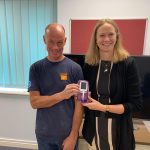 Presentation of Fe-No-machine Dr Bates by Trustees of OCC
