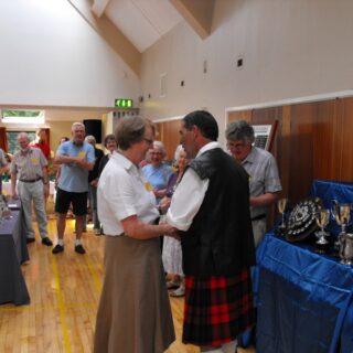Prize giving at the 2012 Village Show, handshake during presentation